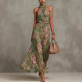 Green graffiti print mesh maxi dress by FitiqueFit featuring high waist, irregular slit, and streetwear-inspired suspender style.