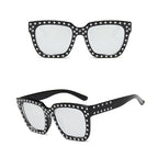 Women's sunglasses with crystal decoration featuring stylish eyewear from FitiqueFit, showcasing trendy design and clear lenses.