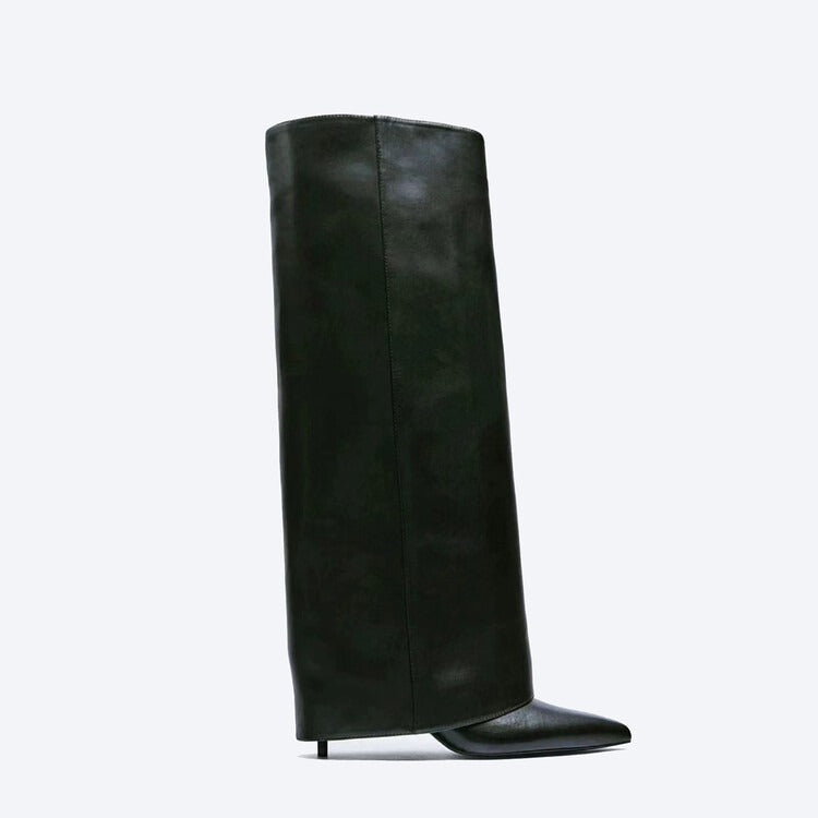 Black leather knee-high pointed-toe boot with wide slouchy shaft and thin stiletto heel.