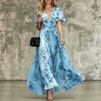 Women's deep V-neck ruffle sleeve printed maxi dress by FitiqueFit, high waist, flowing fabric, floral pattern, elegant and stylish.