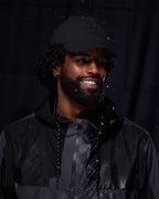 Black waterproof satin-lined dad hat by Plush Fashion Hub, showcasing a stylish and functional accessory with a classic design.
