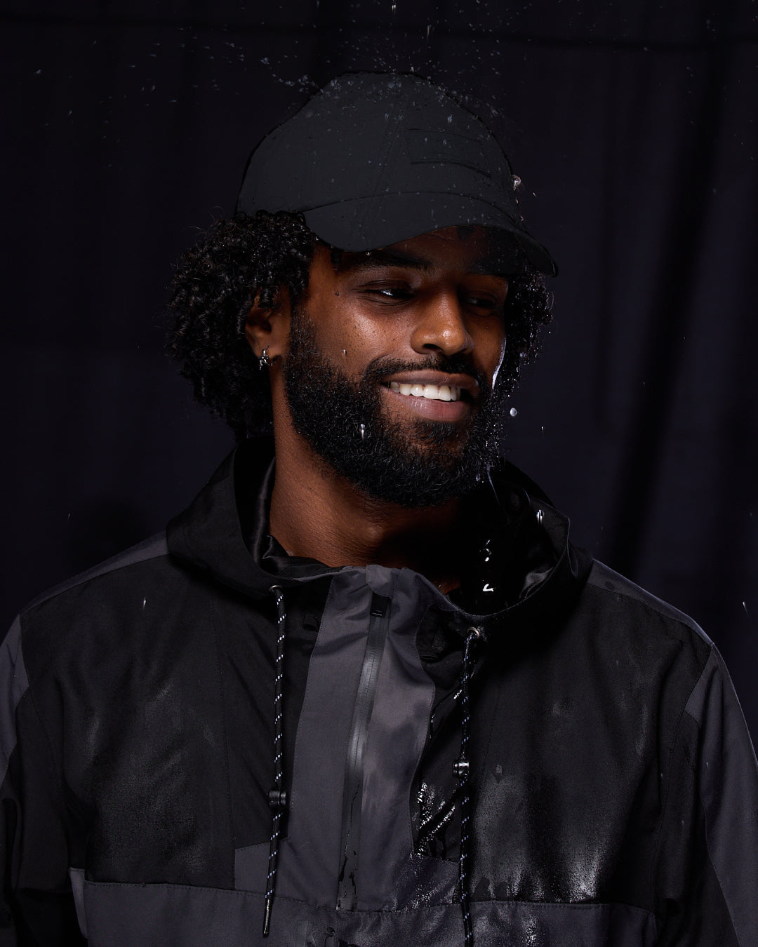 Black waterproof satin-lined dad hat by Plush Fashion Hub, showcasing a stylish and functional accessory with a classic design.