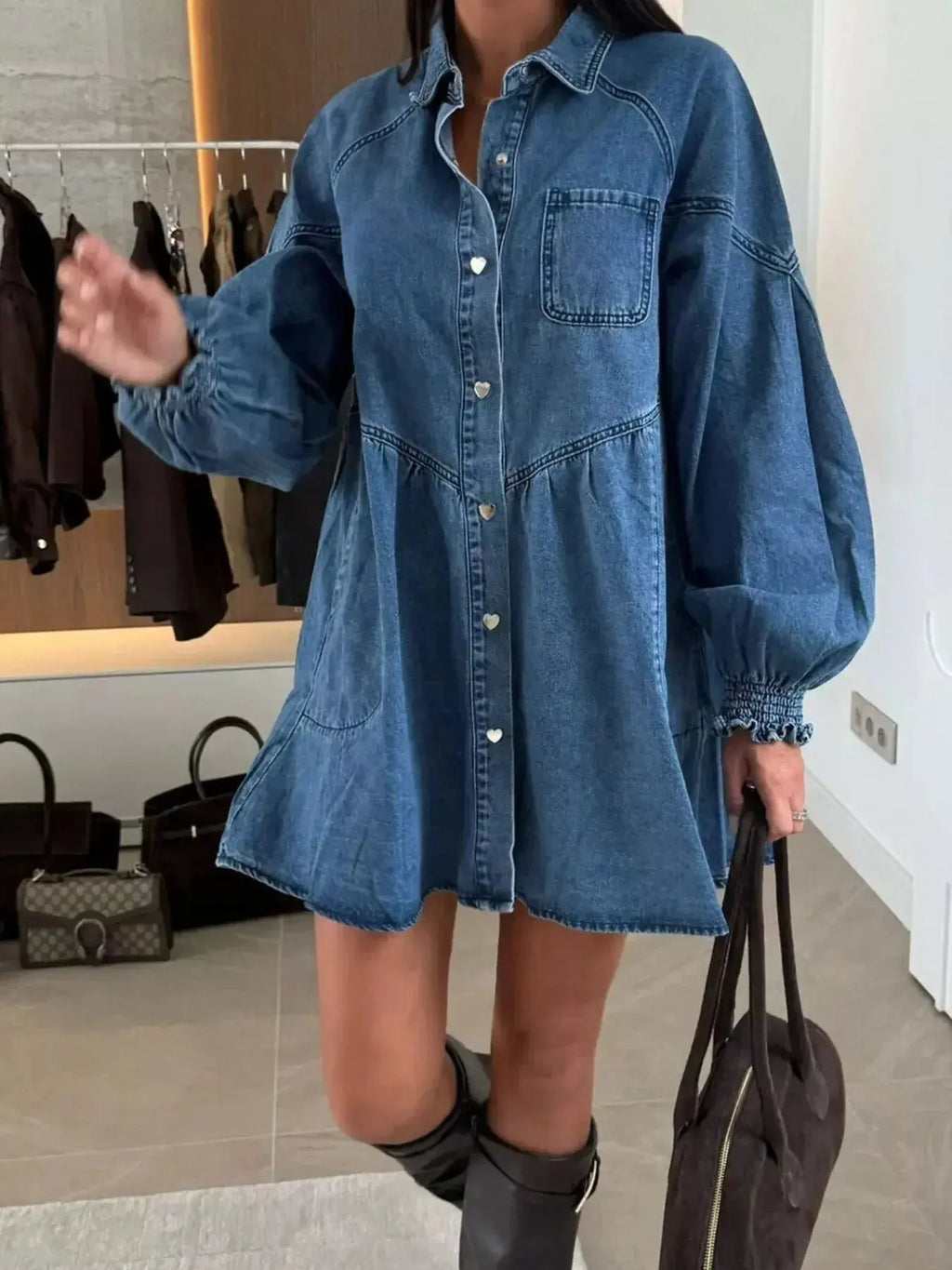Casual mini denim dress by Trendsi featuring a button-down front and front pockets, perfect for everyday wear.
