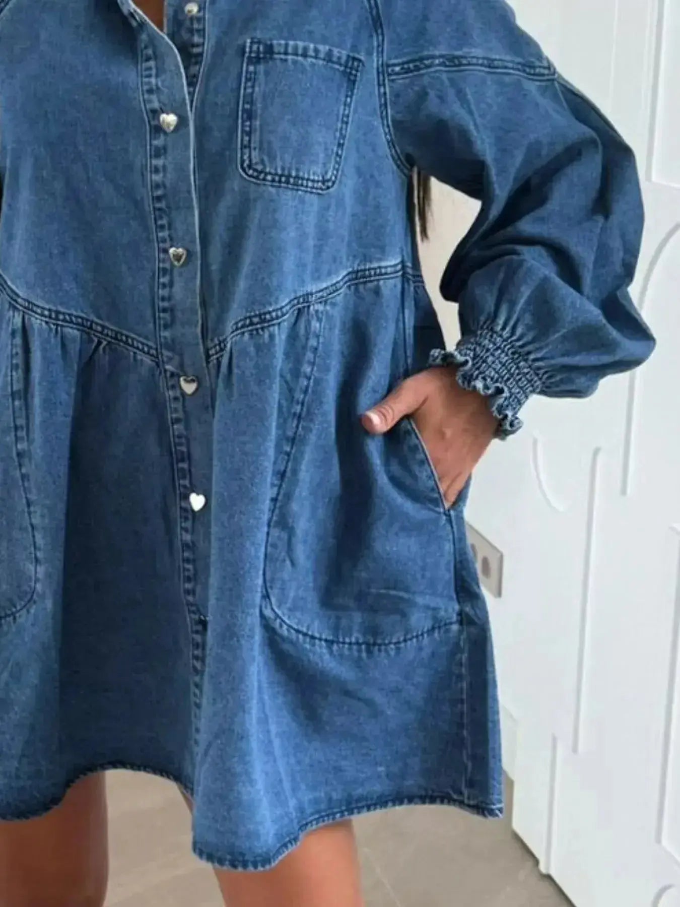 Casual mini denim dress by Trendsi with button-down front and front pockets, perfect for everyday wear.