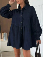 Casual button-down mini denim dress with front pockets by Trendsi, featuring a fitted sleeveless design and classic denim fabric.