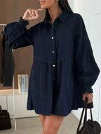 Casual mini denim dress by Trendsi featuring a button-down front and front pockets, perfect for everyday wear.