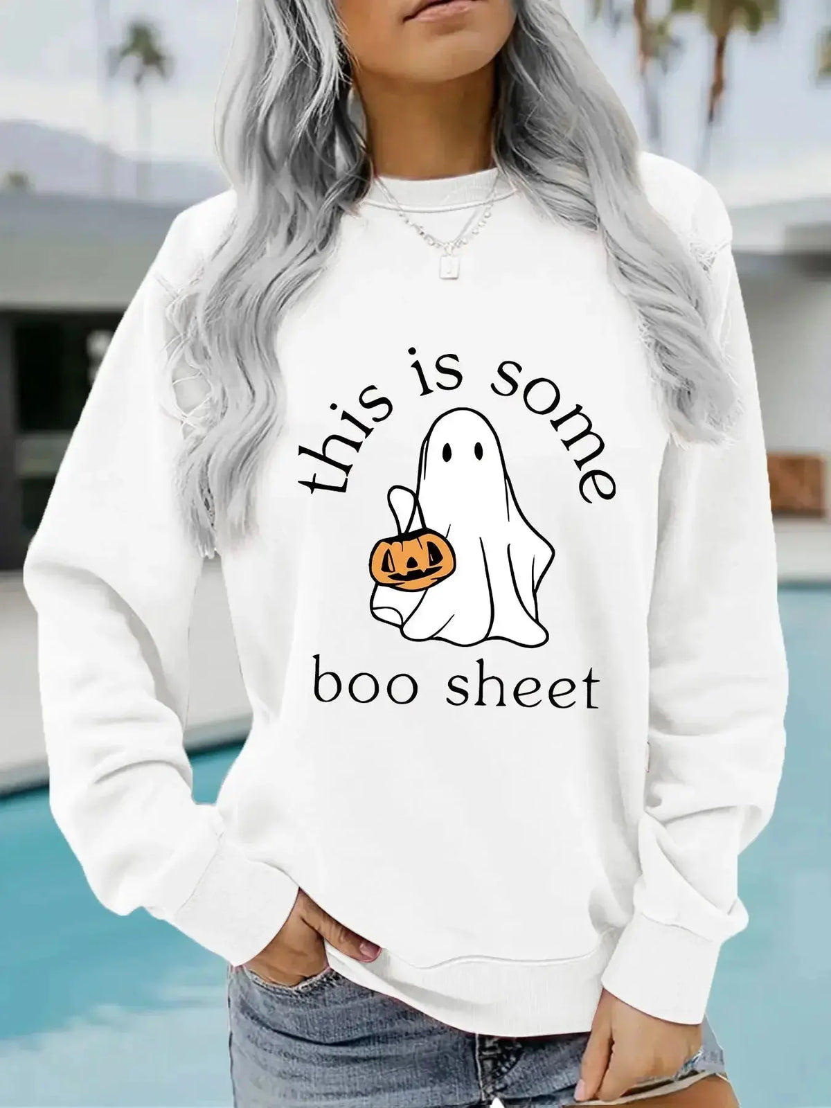 Plush Fashion Hub Boo Sheet Halloween graphic pullover hoodie in cozy cotton blend fleece with long sleeves and round neck.