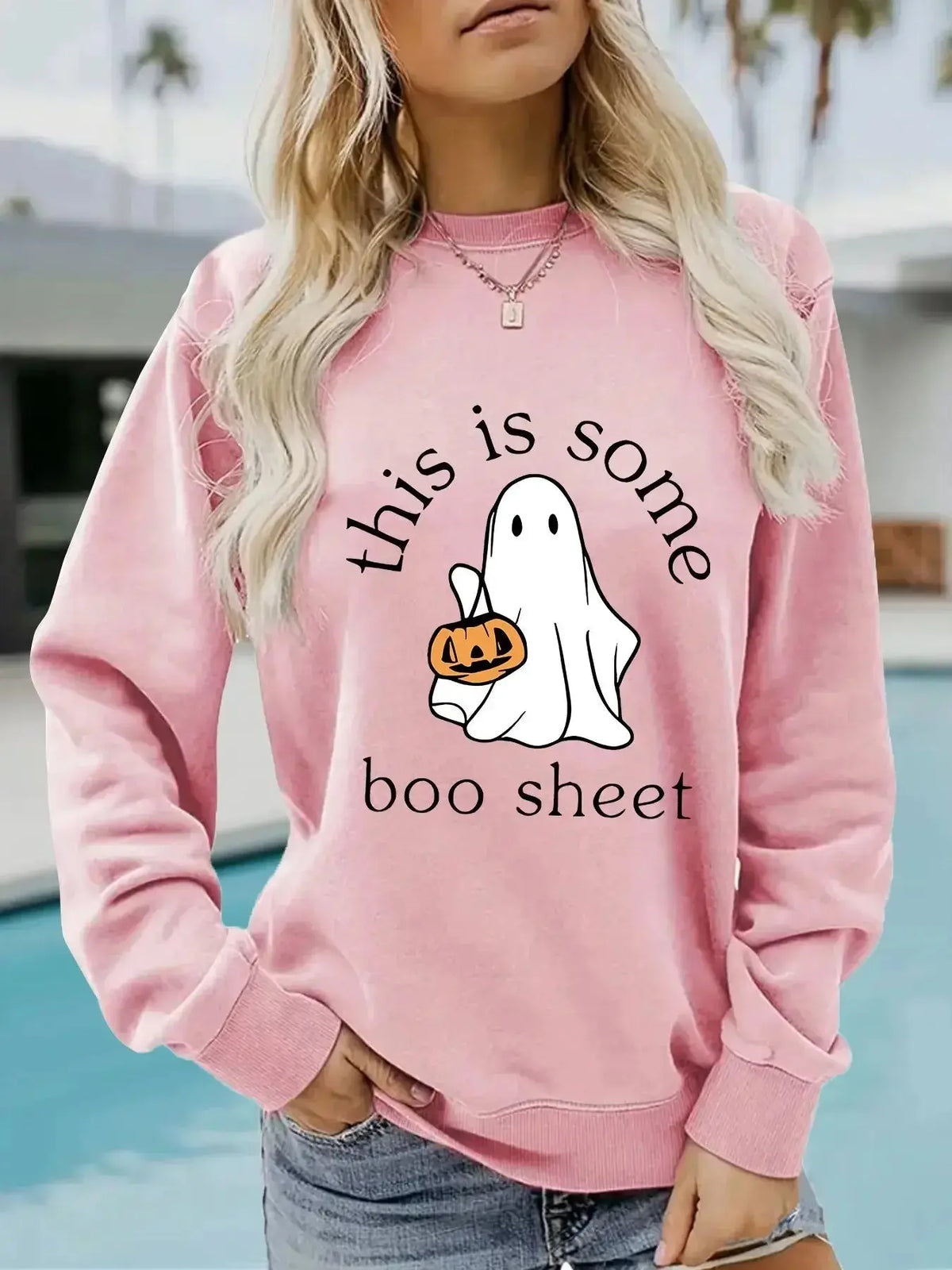 Plush Fashion Hub Boo Sheet Halloween graphic pullover hoodie in cozy cotton blend fleece with long sleeves and round neck.