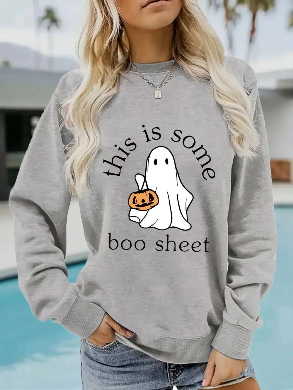 Plush Fashion Hub Boo Sheet Halloween graphic hoodie with long sleeves, round neck, cozy cotton blend fleece, casual and comfortable.