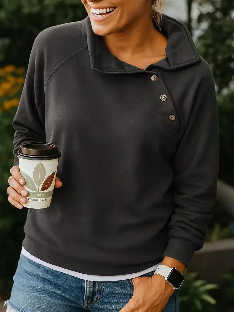 Women's casual slant collar button pullover sweatshirt by Plush Fashion Hub, long-sleeved, relaxed fit solid color top.