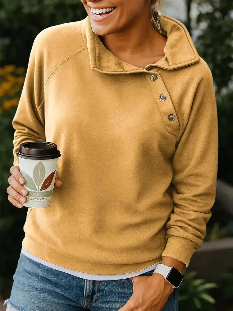 Women's casual slant collar button pullover sweatshirt in solid color, relaxed fit long-sleeve top from Plush Fashion Hub.