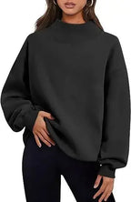 Soft beige women's half-turtleneck fleece sweater from Plush Fashion Hub, casual loose fit loungewear with cozy fleece fabric.