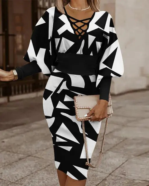 Elegant black V-neck long sleeve women pencil dress by Plush Fashion Hub, fitted silhouette with stylish design.