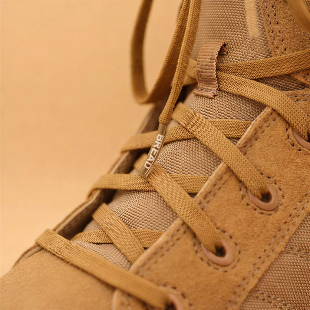 Coyote brown elastic shoelace by Plush Fashion Hub, showing flexible, stretchable laces ideal for athletic and casual shoes.