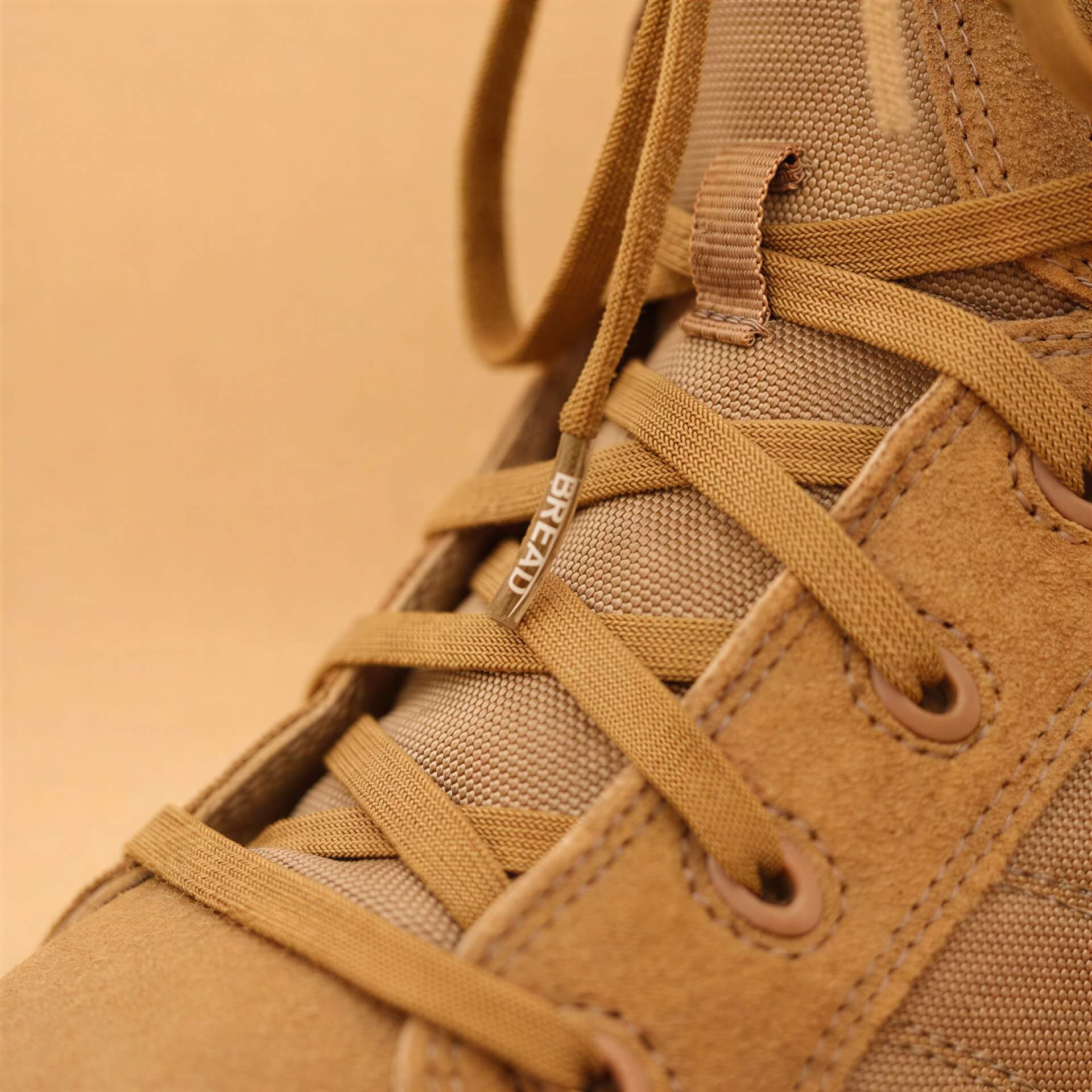 Coyote brown elastic shoelace by Plush Fashion Hub, showing flexible, stretchable laces ideal for athletic and casual shoes.