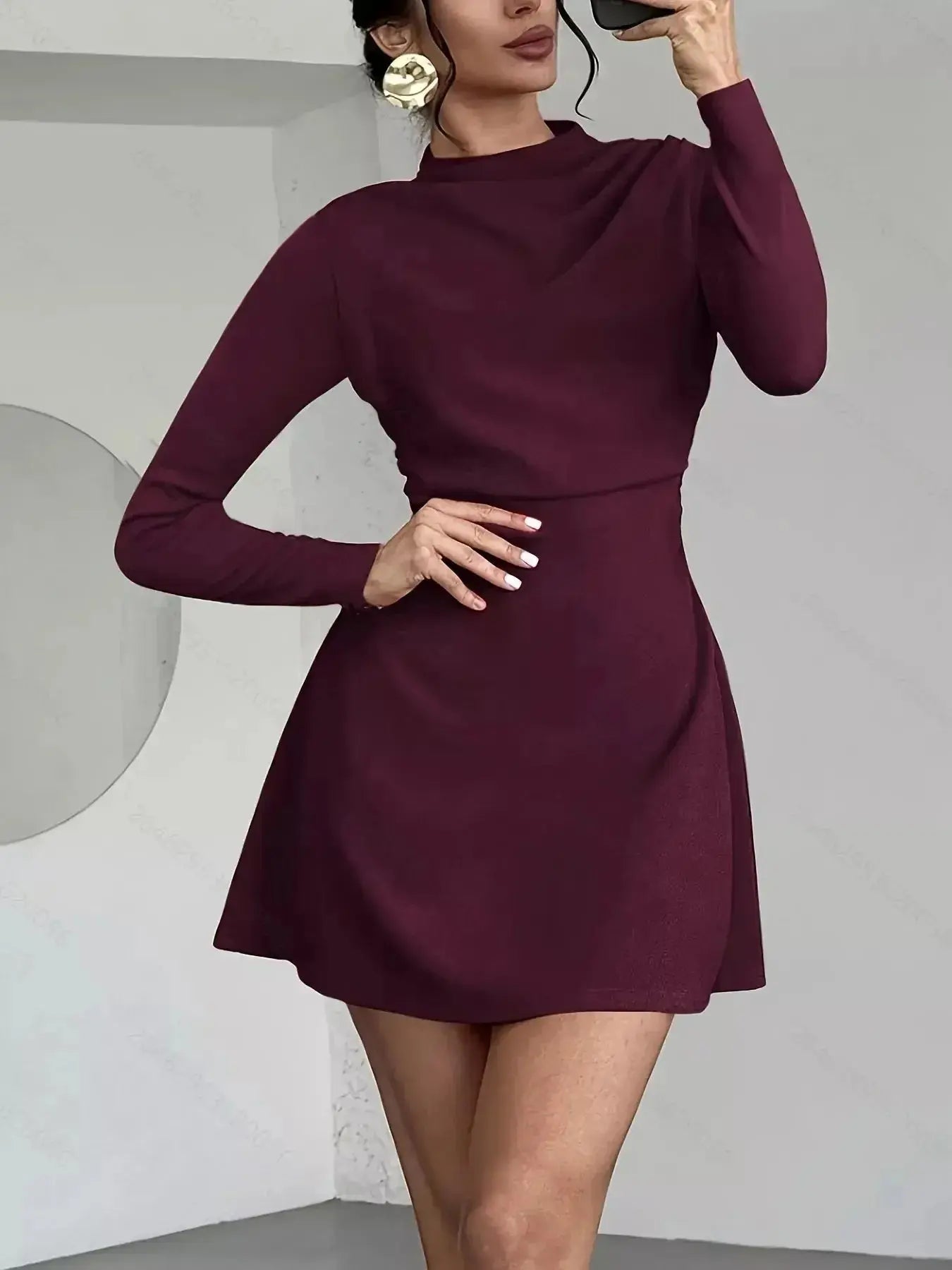 Chic black mock neck long sleeve mini dress by Trendsi, soft stretchy casual fitted dress, perfect for everyday wear.