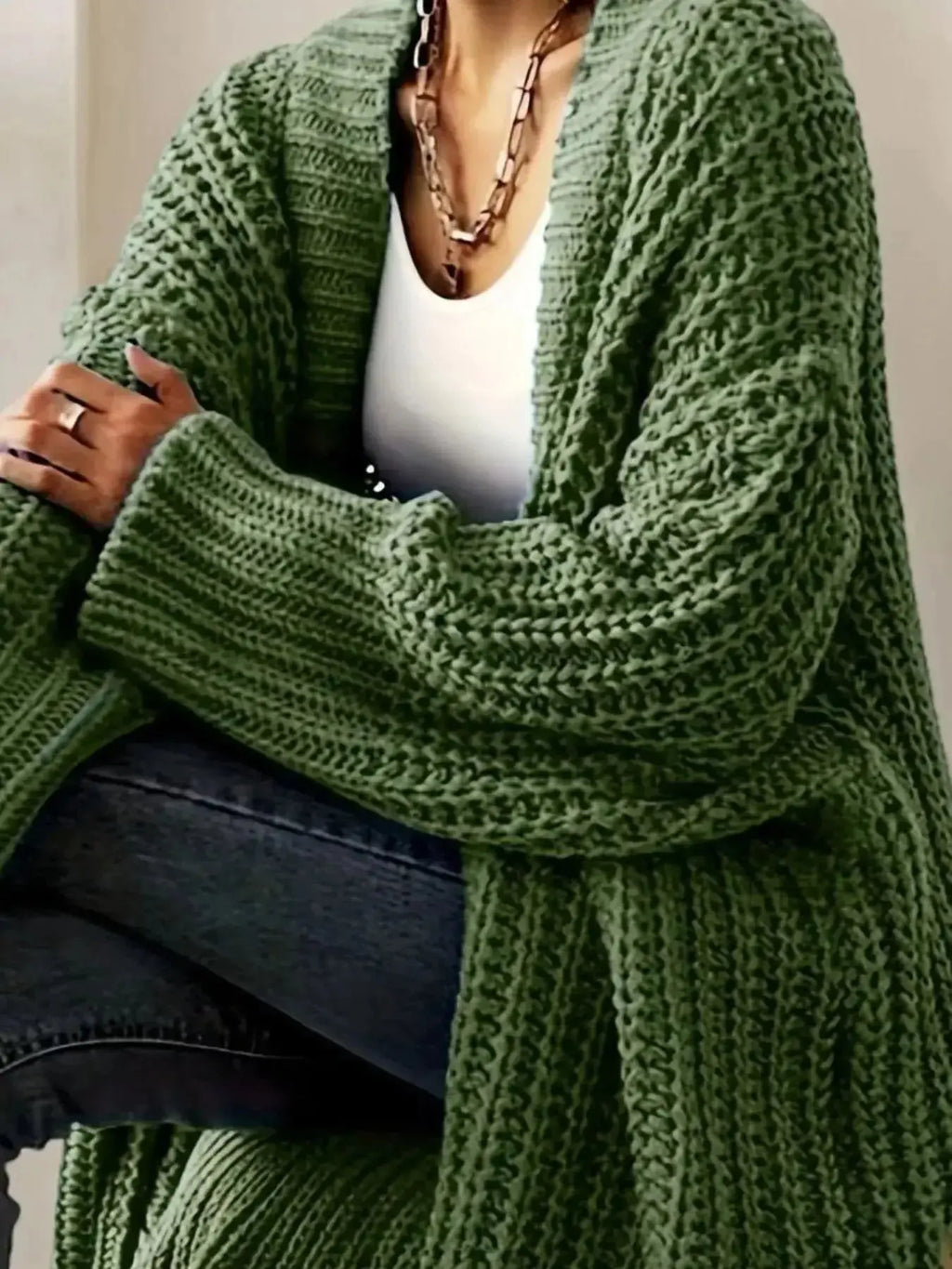 Women’s chunky knit open-front cardigan with long sleeves from Plush Fashion Hub, cozy layering sweater in soft, textured yarn.