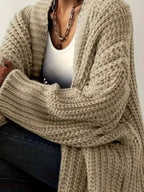 Women's chunky knit open-front cardigan by Plush Fashion Hub, cozy long sleeve layering sweater with a relaxed fit and textured knit pattern.