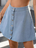 Denim A-line skirt with button-front closure from Trendsi, featuring a classic style and medium wash finish.