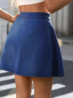 Light blue denim A-line skirt with button front closure, casual style, from Trendsi's Classic Button-Front Denim Skirt collection.