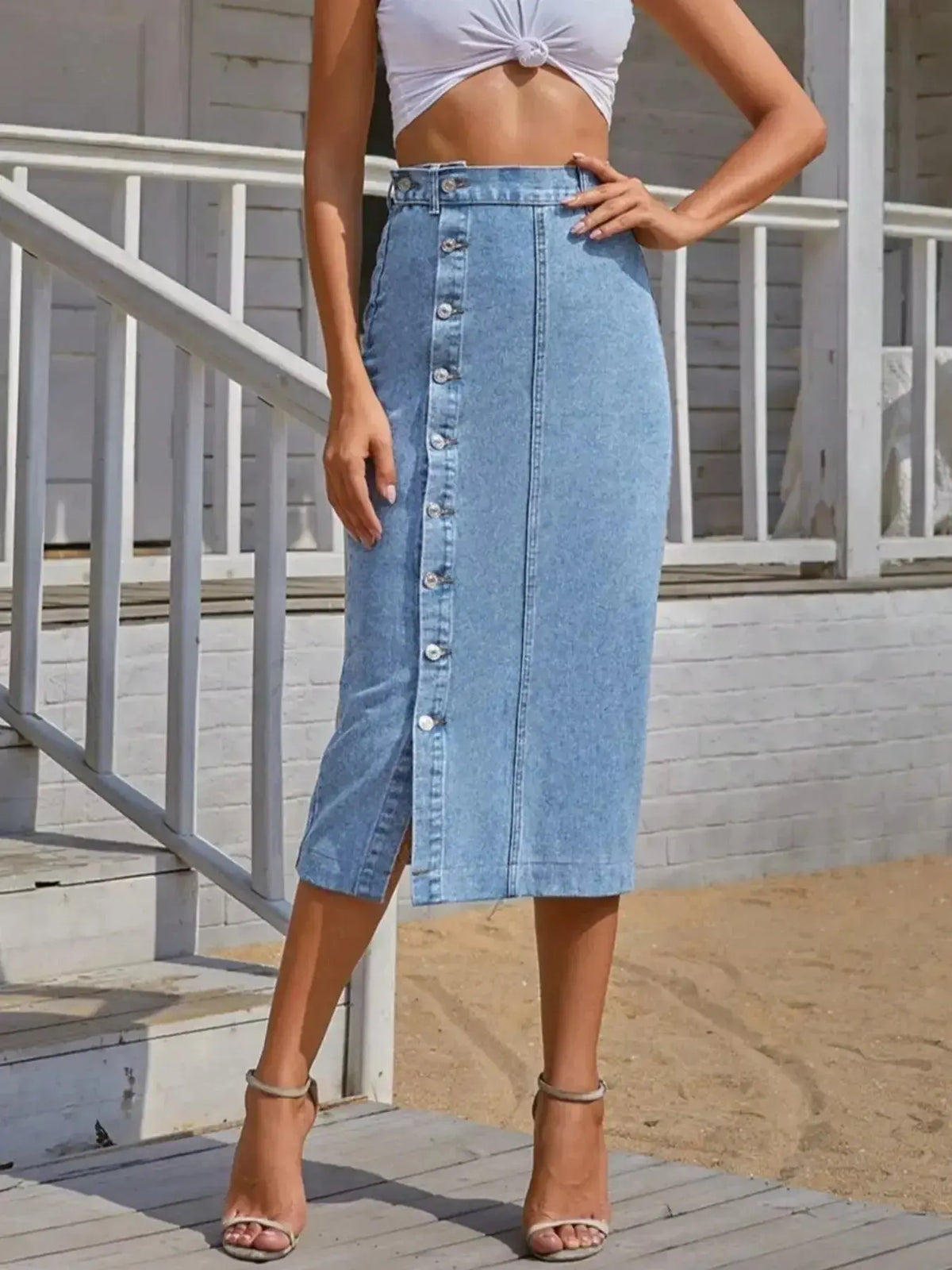 Stretch denim skirt for women with button-front closure, featuring a classic style and comfortable fit by Plush Fashion Hub.