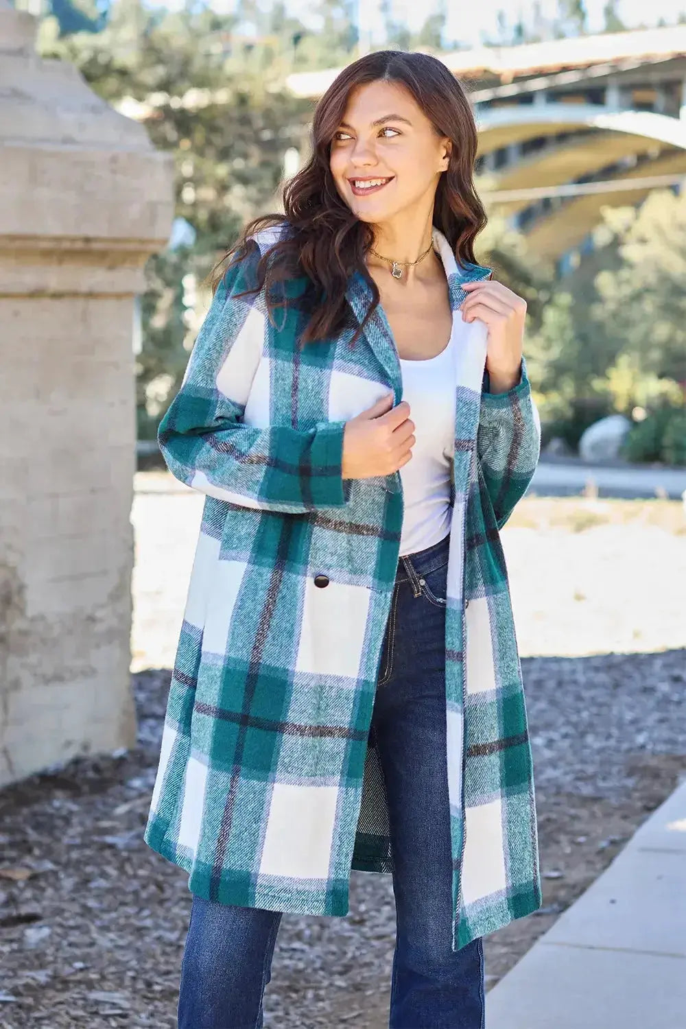 Women's plaid button-up lapel coat with wool-feel fabric, featuring classic pattern and stylish outerwear design.