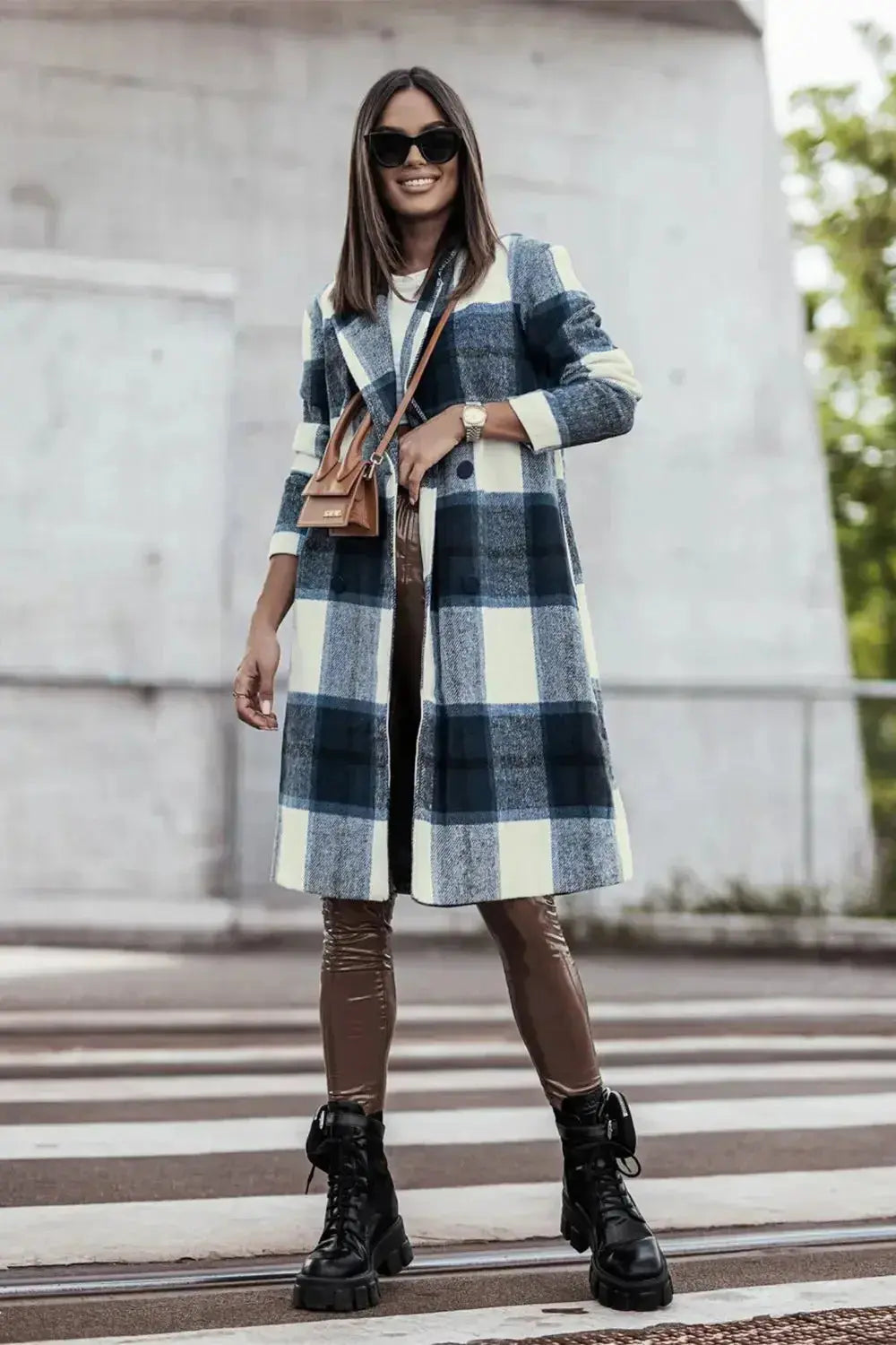 Women's classic plaid button-up lapel coat in wool-feel fabric, stylish seasonal outerwear by Trendsi.
