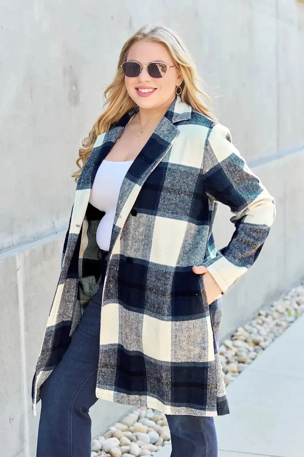 Women's classic plaid button-up lapel coat with a wool-feel texture, perfect for seasonal outerwear, by Trendsi.