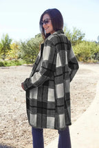 Women's classic plaid button-up lapel coat with wool-feel fabric, stylish seasonal outerwear by Trendsi.