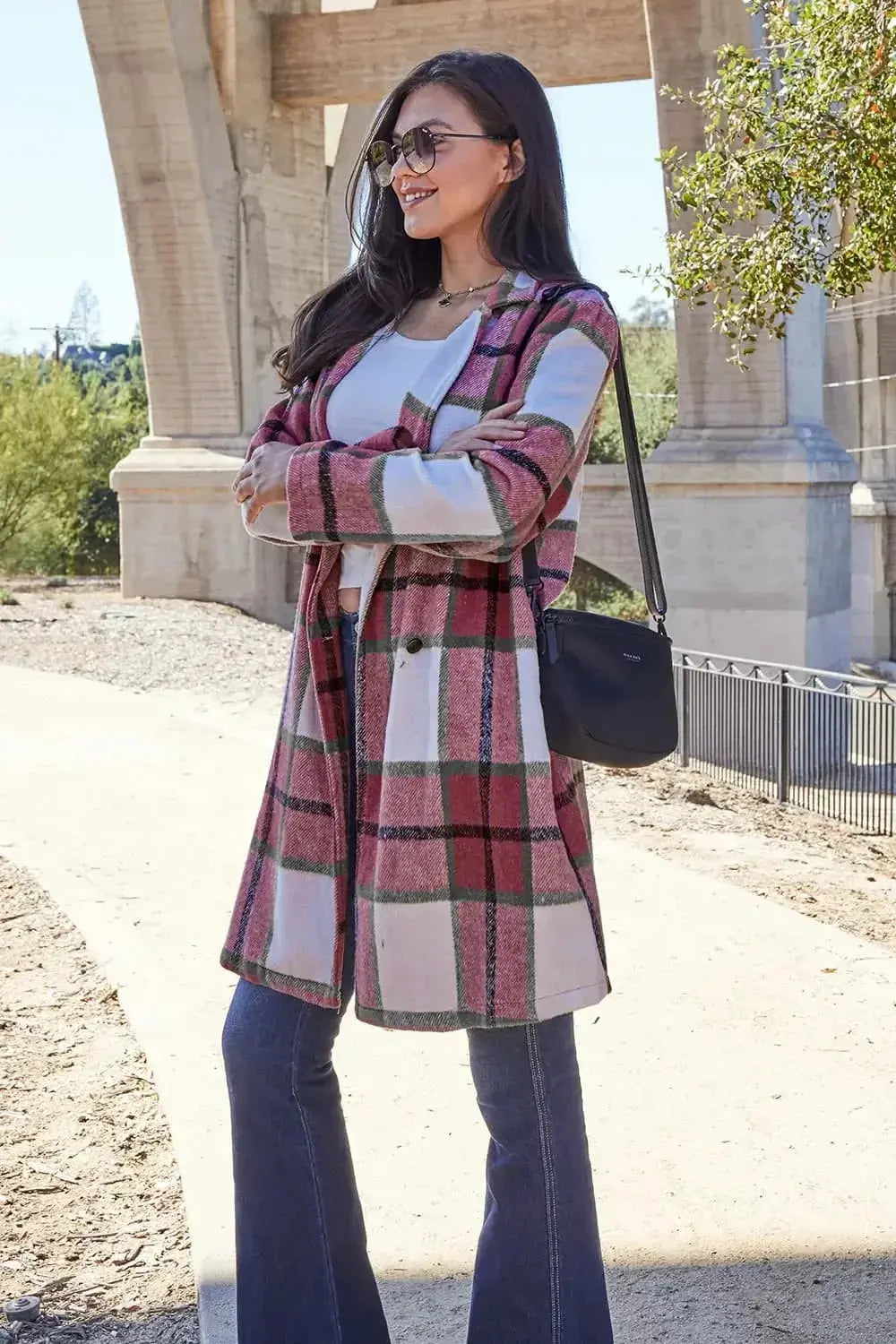 Women's classic plaid button-up lapel coat with wool-feel fabric, stylish outerwear for seasonal wear by Trendsi.