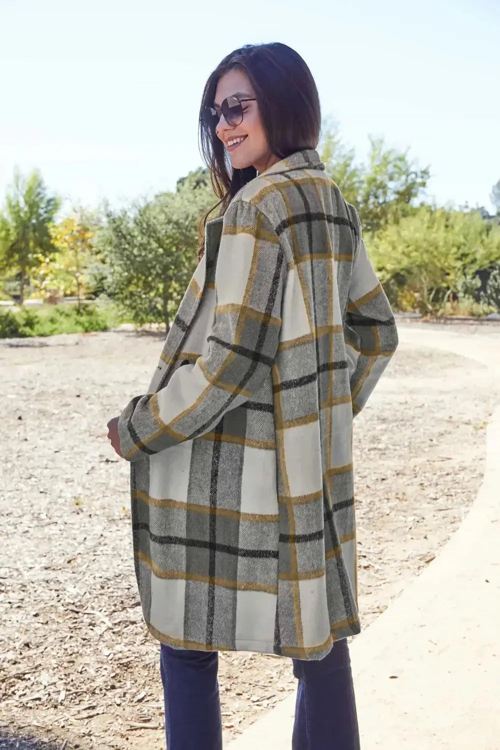 Women's classic plaid button-up lapel coat with a wool-feel outer, featuring a timeless design and cozy seasonal style.