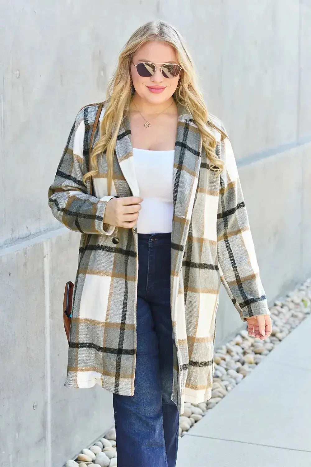 Women's classic plaid button-up lapel coat with a wool-feel outer, stylish seasonal outerwear by Trendsi.