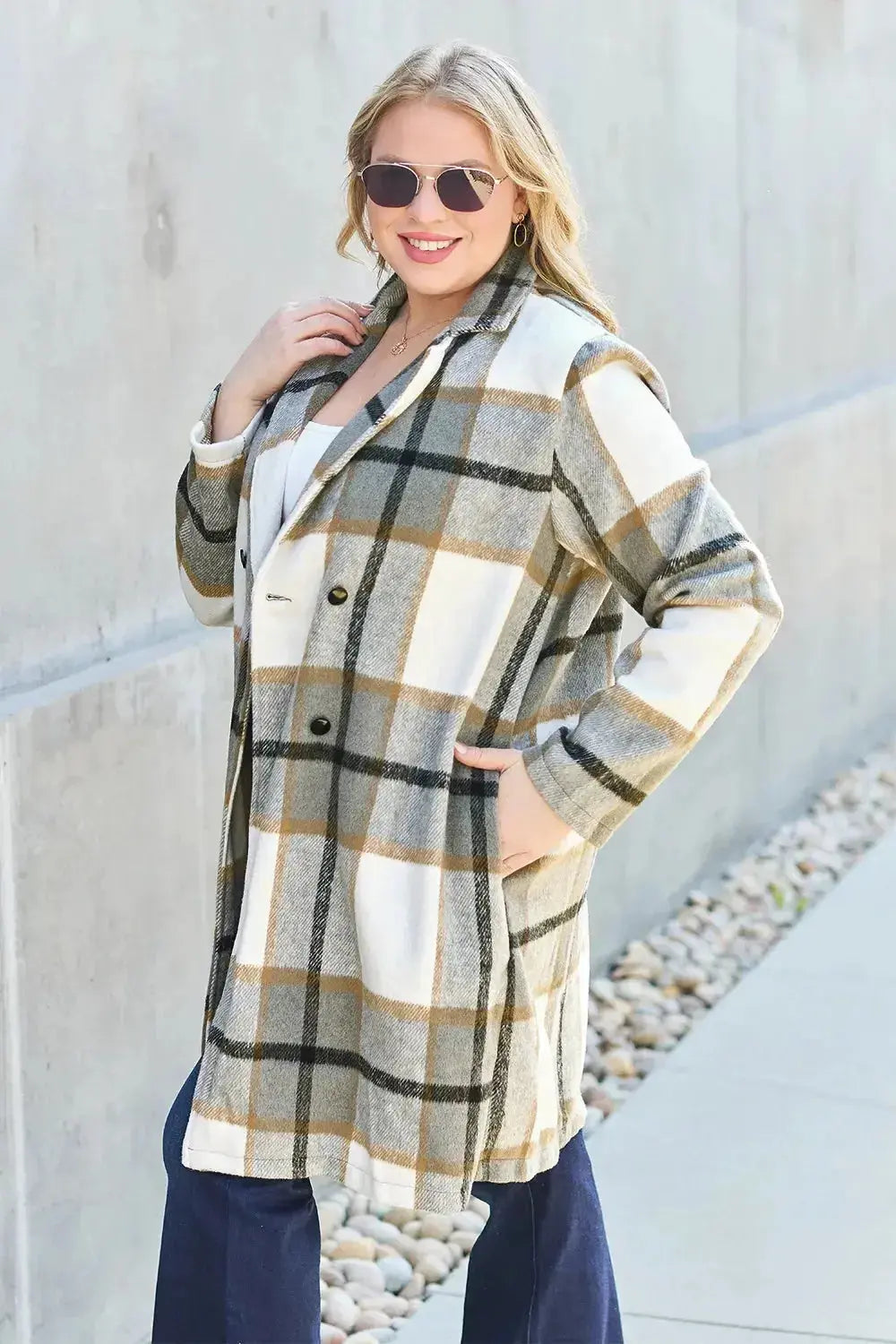 Women's classic plaid button-up lapel coat with a wool-feel outerwear design, featuring a stylish and cozy seasonal coat by Trendsi.