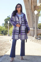 Women's classic plaid button-up lapel coat by Trendsi, featuring a wool-feel outerwear design with a stylish seasonal look.