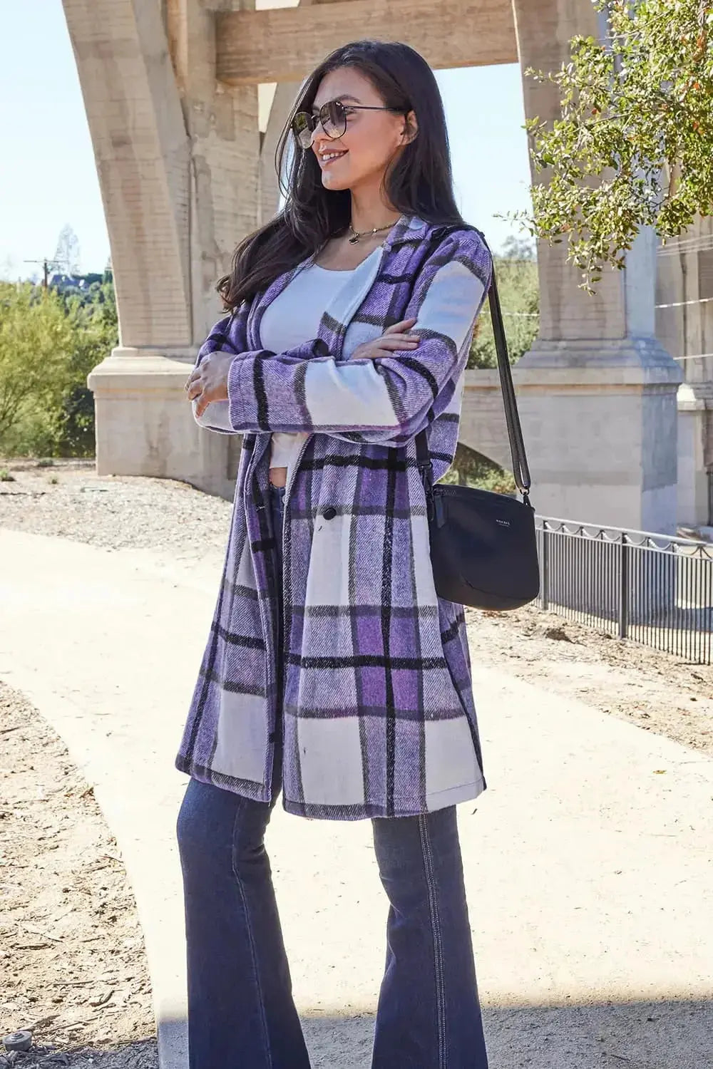Women's classic plaid button-up lapel coat by Trendsi, featuring a wool-feel outerwear design with stylish seasonal warmth.