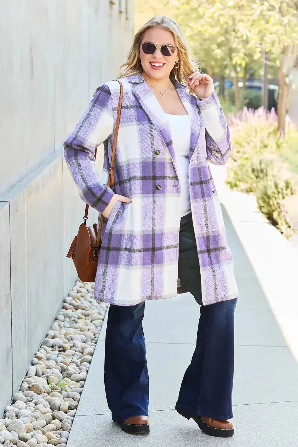 Women's classic plaid button-up lapel coat by Trendsi, featuring a wool-feel outer layer and seasonal stylish design.