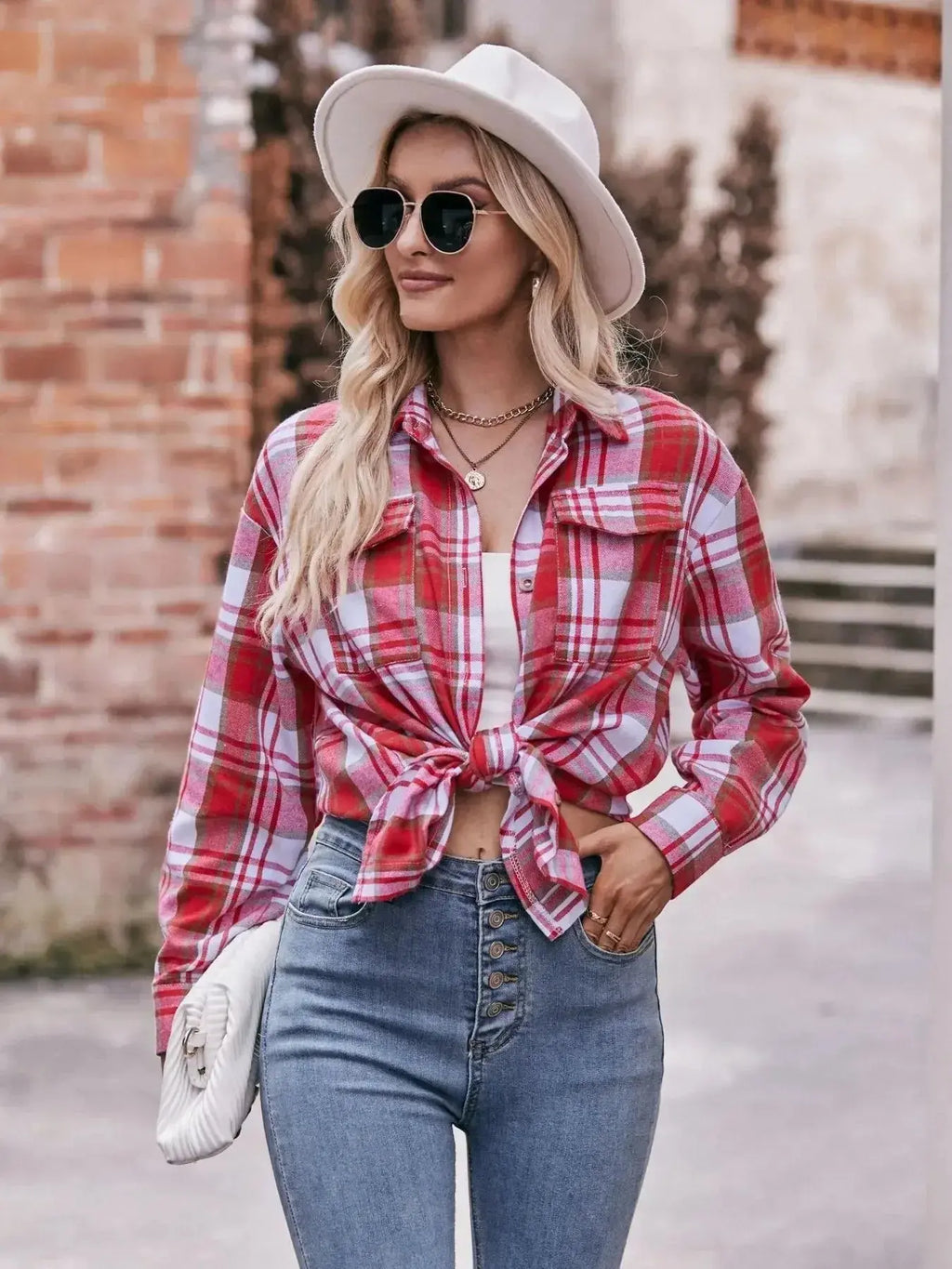 Women’s classic plaid long sleeve button-down shirt by Trendsi, featuring a timeless pattern and comfortable fit.