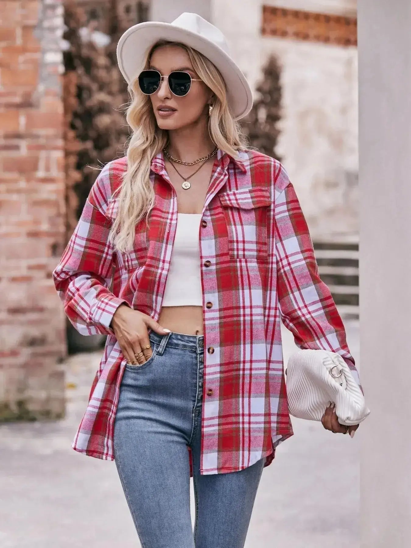 Women's classic plaid long sleeve button-down shirt by Trendsi, featuring a stylish plaid pattern and collared design.