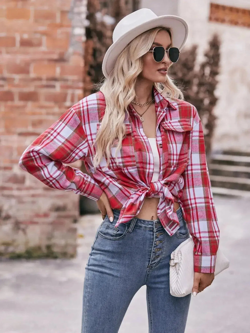 Women's classic plaid long sleeve button-down shirt by Trendsi, featuring a stylish checkered pattern and collar detail.