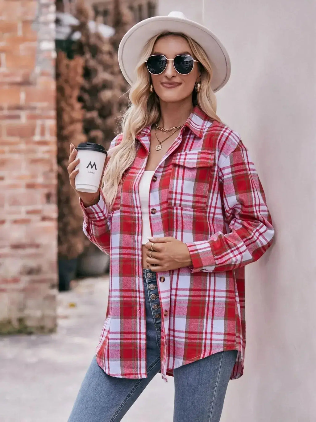 Women’s classic plaid long sleeve button-down shirt by Trendsi, featuring a stylish and timeless plaid pattern with button-front closure.