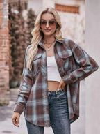 Women's classic plaid long sleeve button-down shirt by Trendsi, featuring a timeless pattern and casual fit.