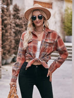 Women’s classic plaid long sleeve button-down shirt by Trendsi, featuring a traditional checkered pattern and collar.