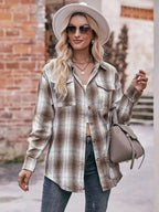 Women’s classic plaid long sleeve button-down shirt by Trendsi, featuring a traditional checkered pattern and collar detail.