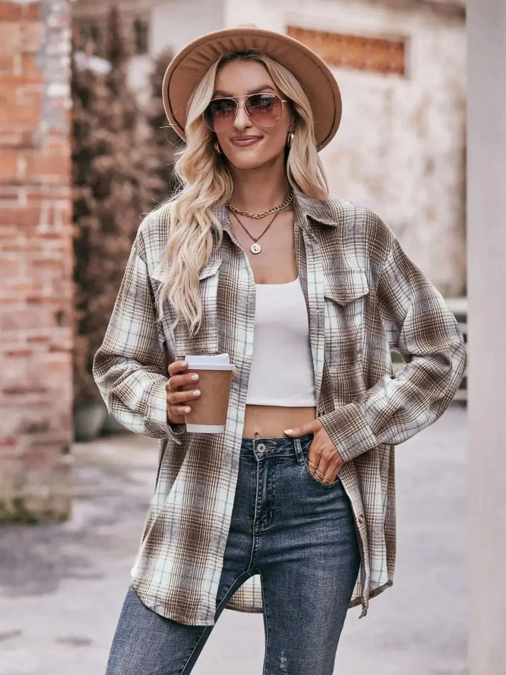 Women’s classic plaid long sleeve button-down shirt by Trendsi, featuring a stylish checkered pattern and tailored fit.