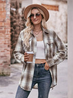 Women’s classic plaid long sleeve button-down shirt by Trendsi, featuring a stylish checkered pattern and tailored fit.