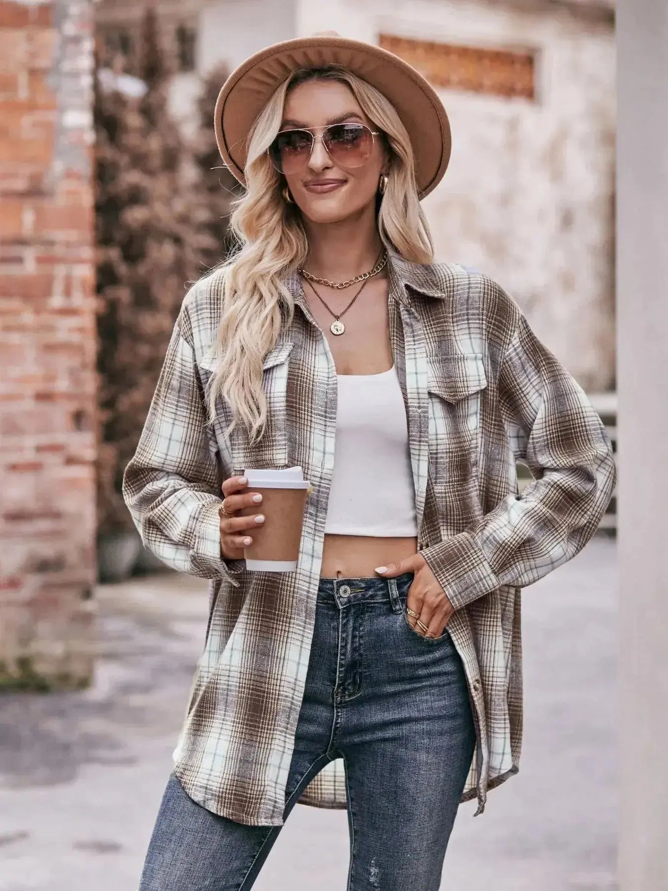 Women’s classic plaid long sleeve button-down shirt by Trendsi, featuring a stylish checkered pattern and tailored fit.