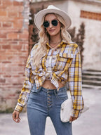 Women’s classic plaid long sleeve button-down shirt by Trendsi, featuring a stylish pattern and comfortable fit.