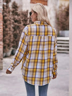 Women’s classic plaid long sleeve button-down shirt by Trendsi, featuring a timeless pattern and casual fit.