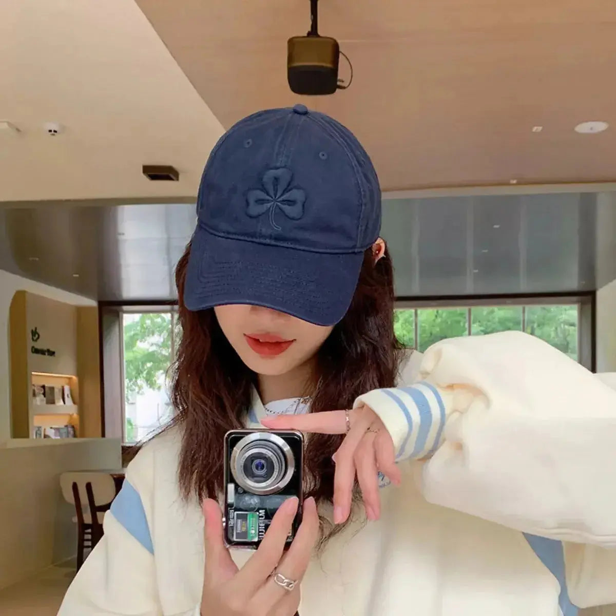 Clover embroidered 100% cotton baseball cap by Trendsi, breathable casual hat with adjustable strap and classic design.