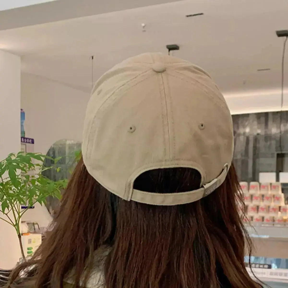Clover embroidered 100% cotton baseball cap by Trendsi, breathable casual hat with a classic curved brim and adjustable strap.